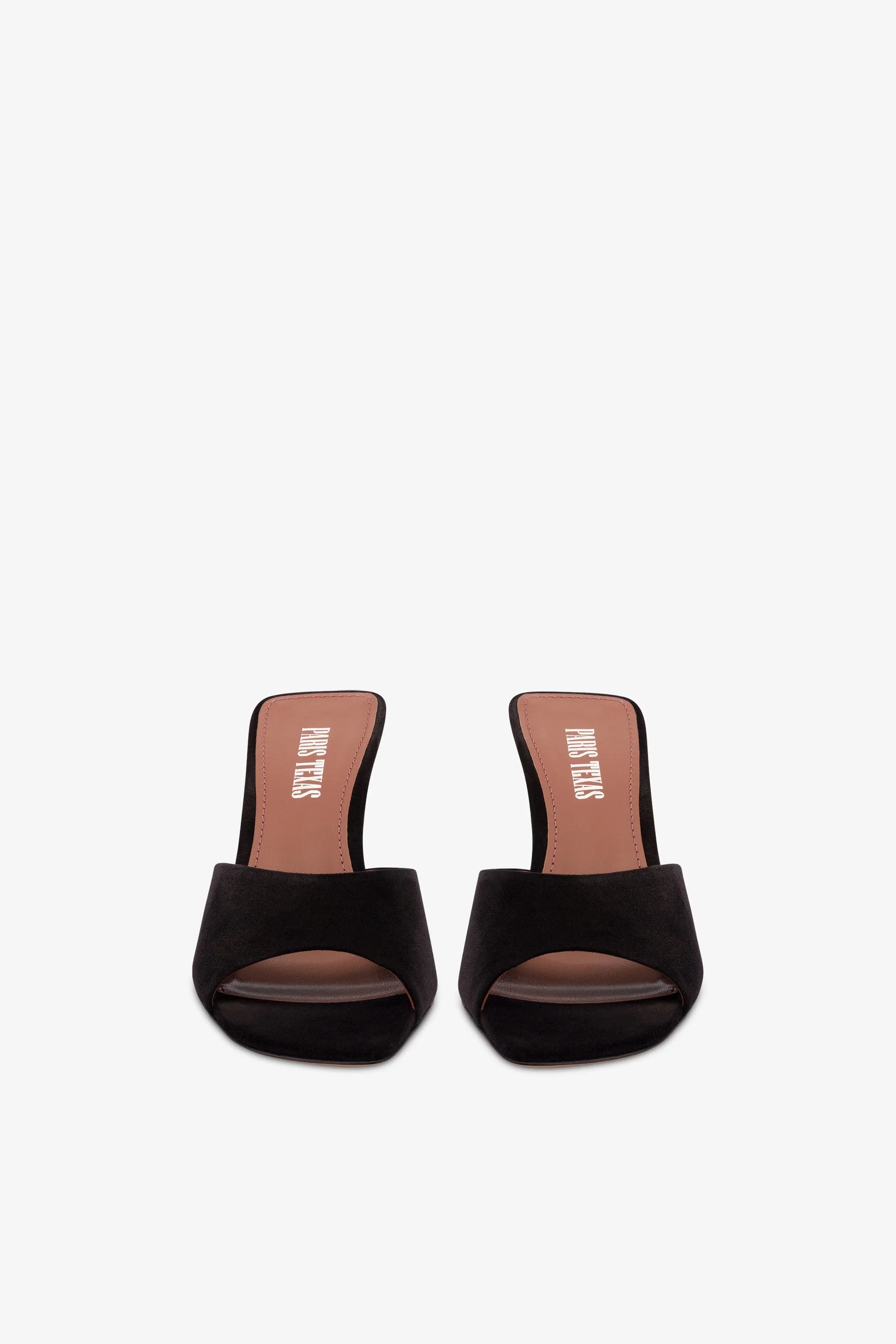 Mules in black suede leather