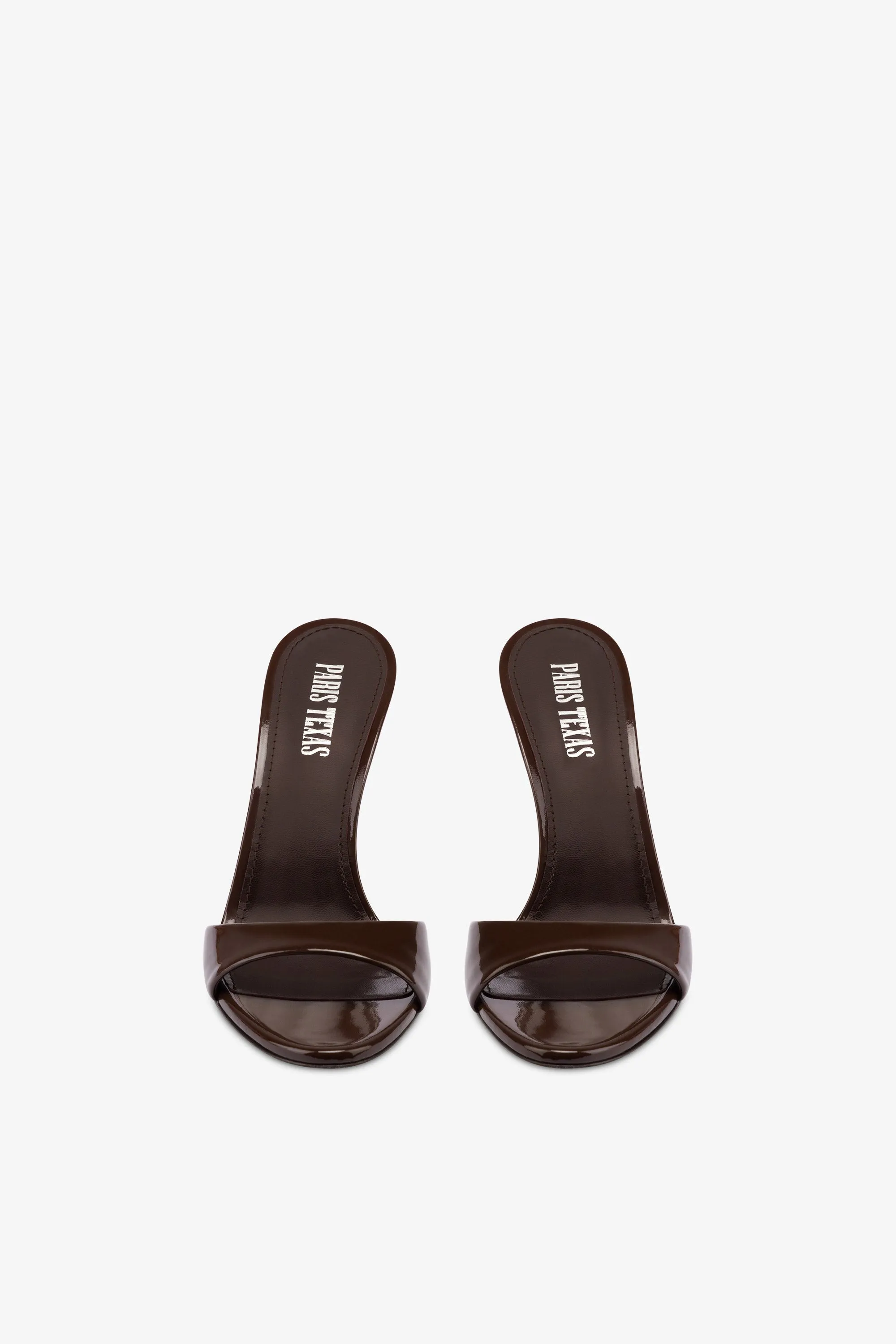 Mules in chocolate patent leather
