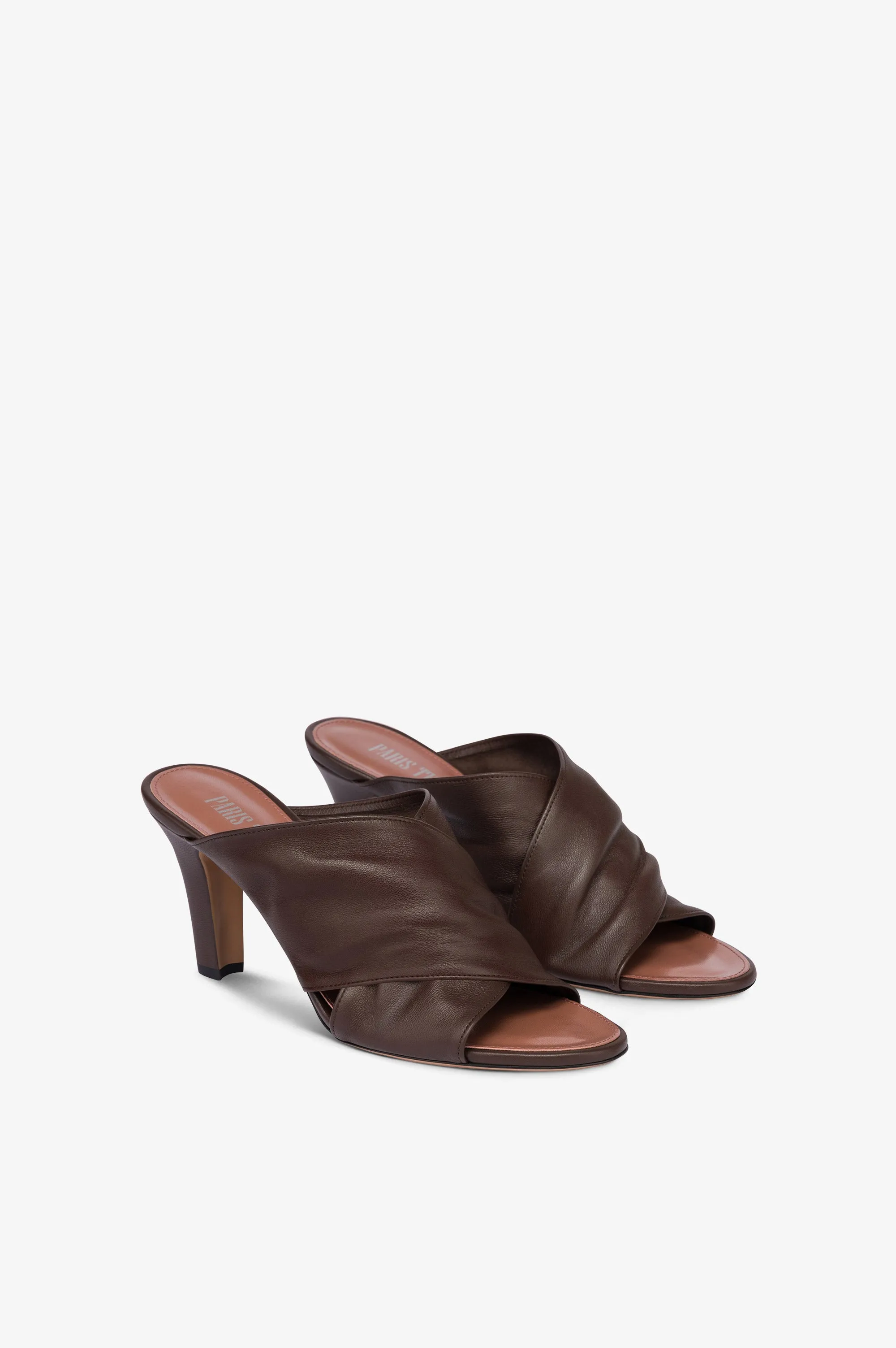 Mules in ebony leather