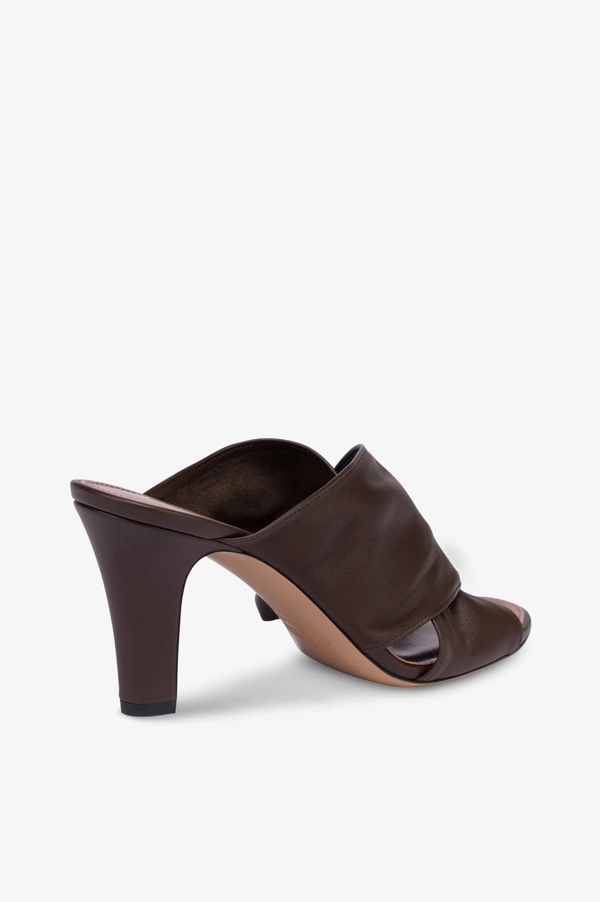 Mules in ebony leather