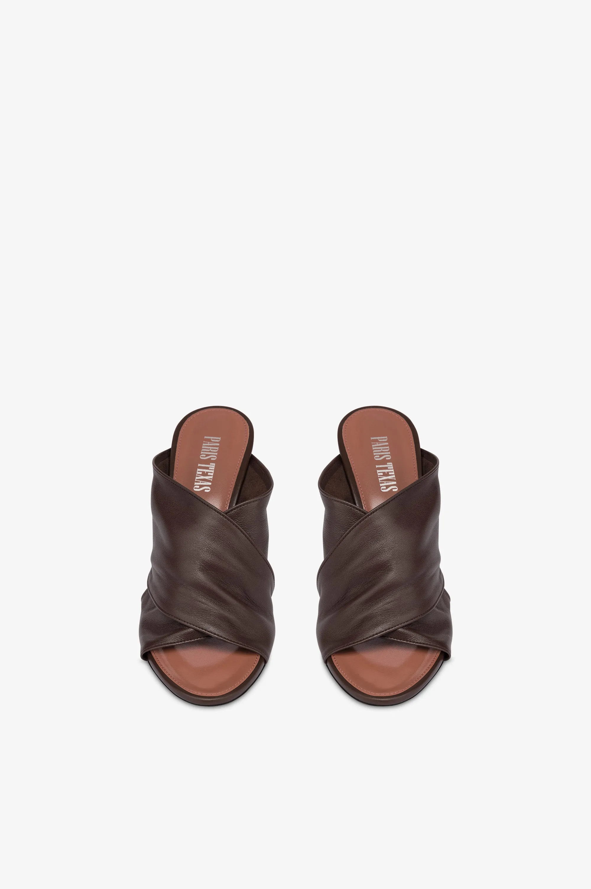 Mules in ebony leather