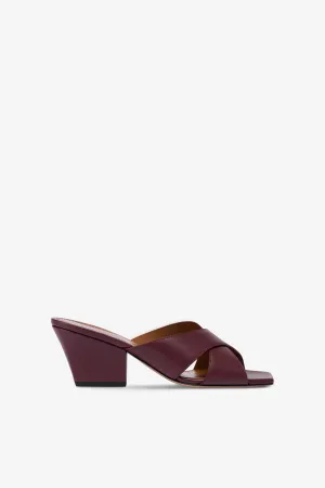 Mules in rouge noir leather