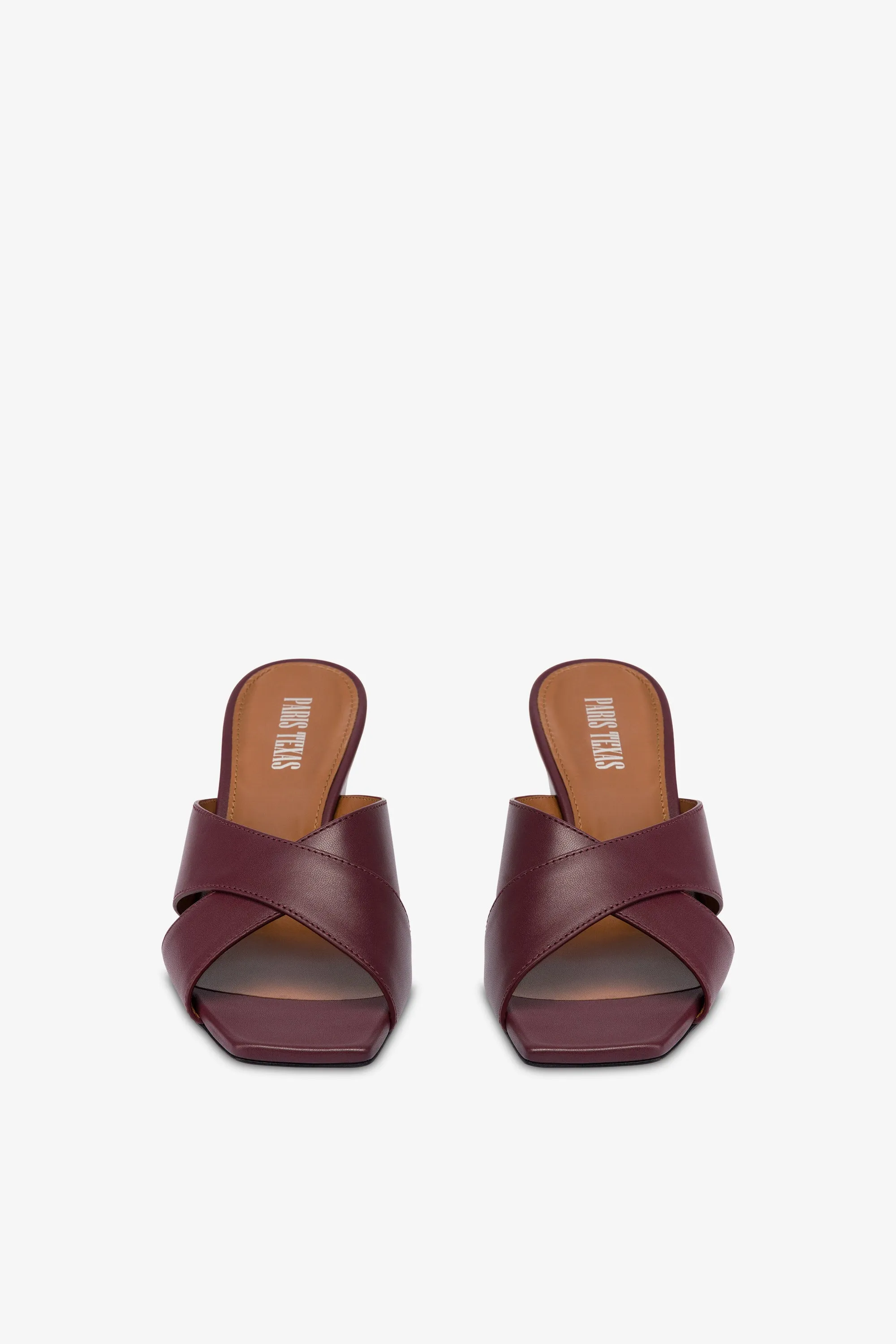 Mules in rouge noir leather