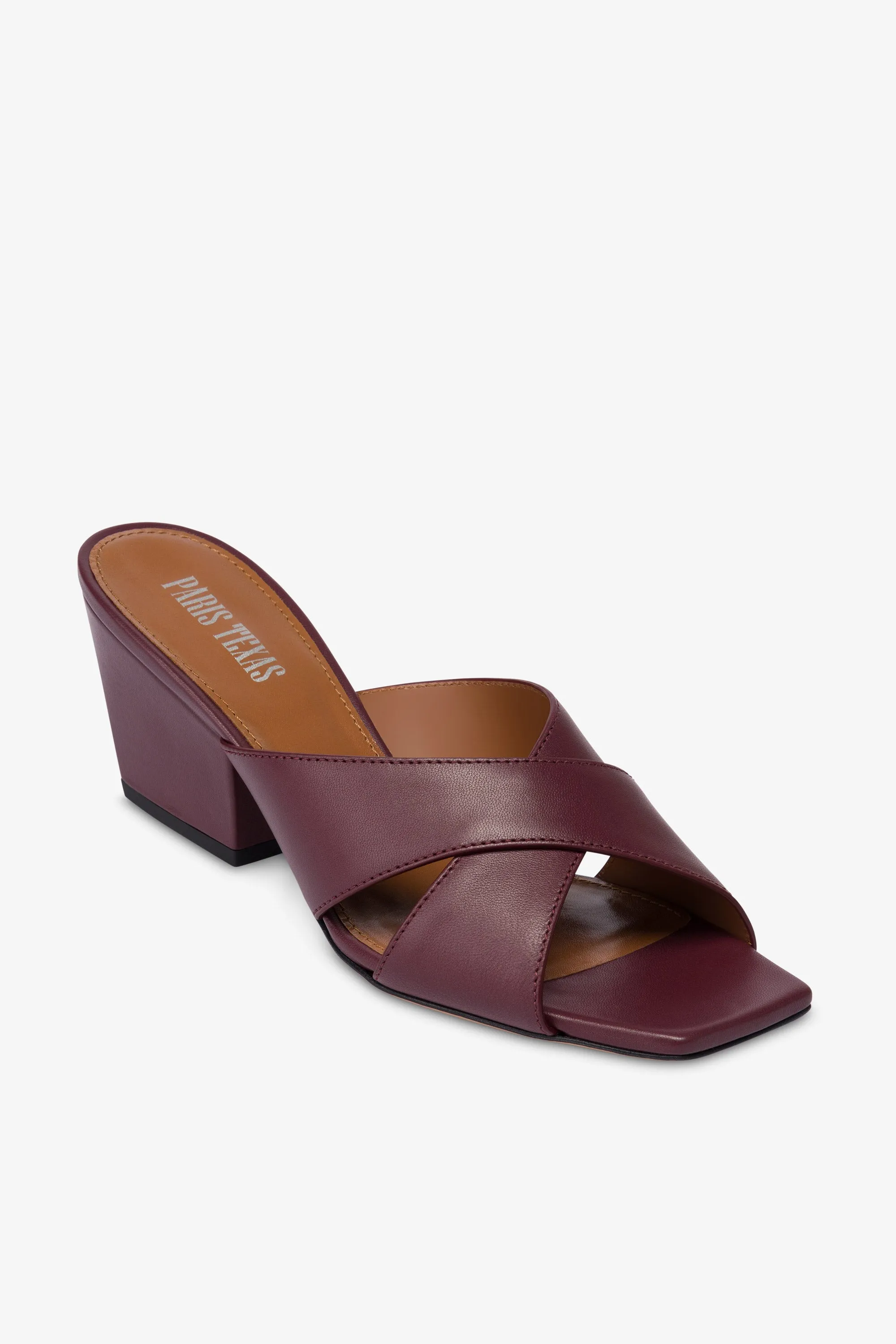Mules in rouge noir leather