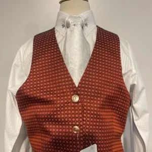 Red vest with green dot
