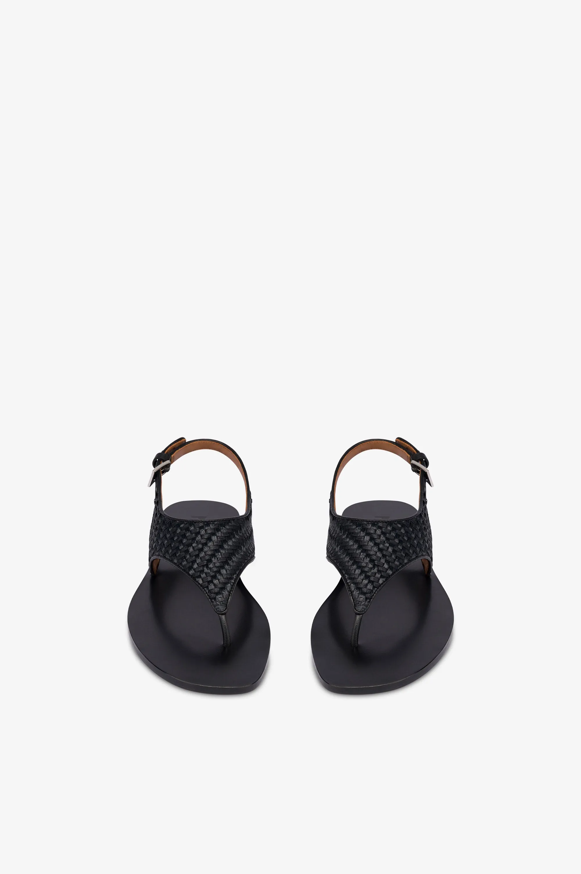 Sandals in natural raffia and black leather